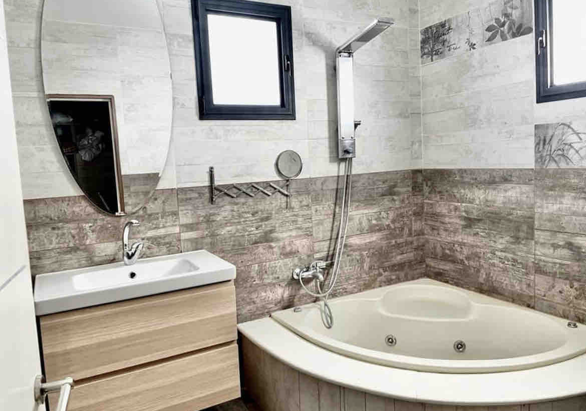 A spa-style corner jacuzzi retreat