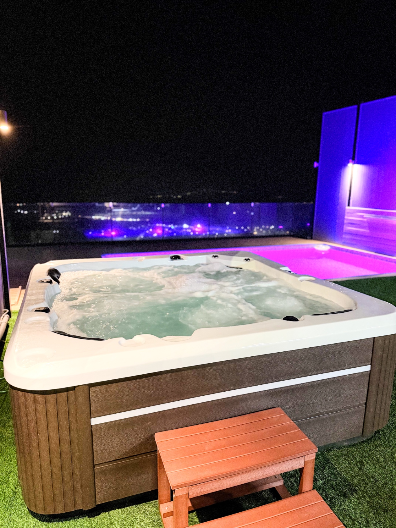 Bubbling outdoor jacuzzi at night