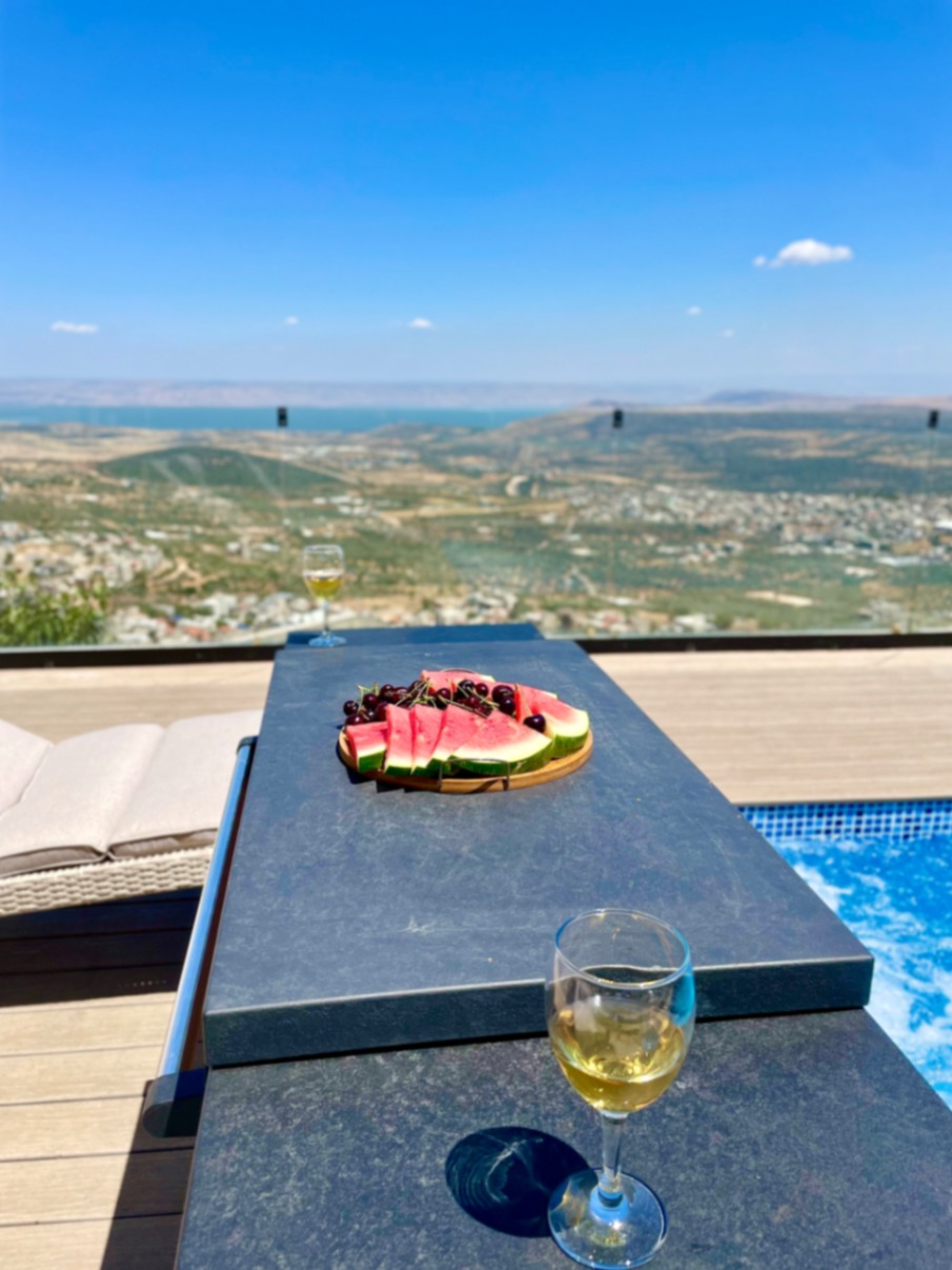 Platter of fresh fruit beside the pool