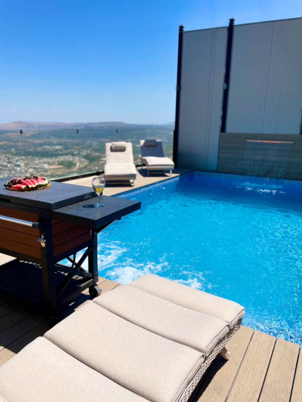 Resort pool deck with mountain views