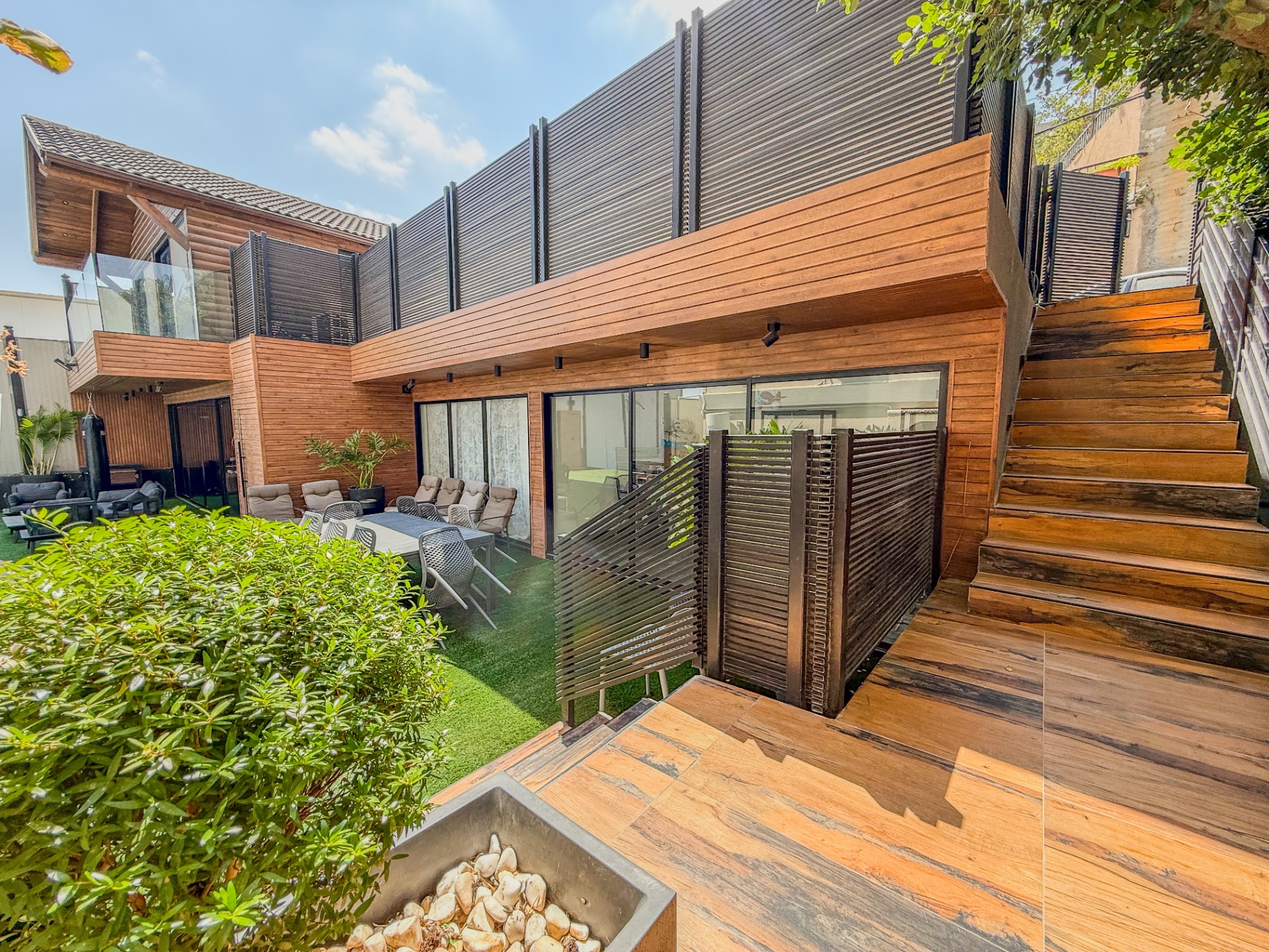 Private cedar courtyard with dining and fire pit